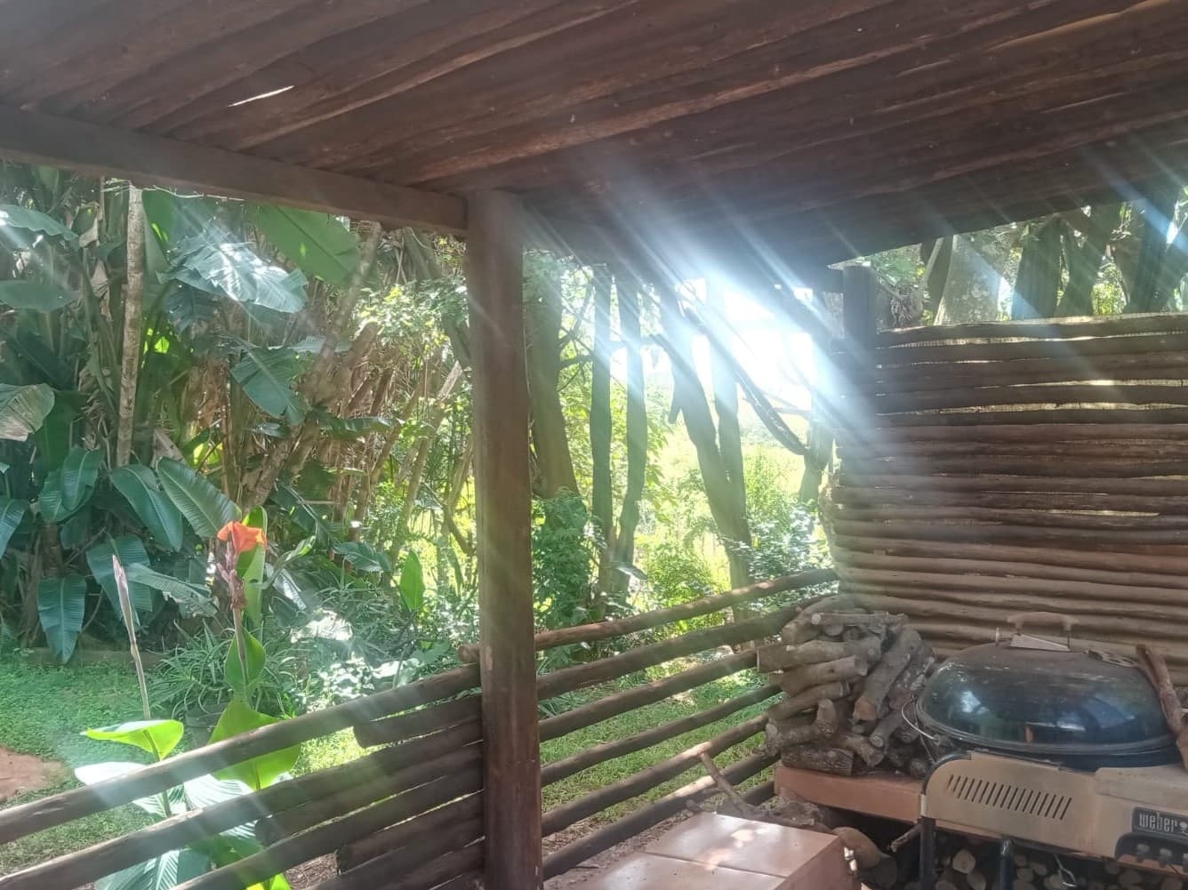 Firewood and braai stand at Ethlathini Rest Camp campsite, Hluhluwe KZN